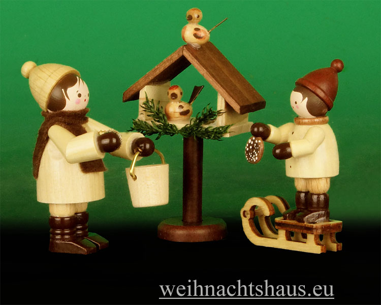 Romy Thiel Winterkinder Neuheiten Winterkind Neuheit Winterkinderfigurenl Thielfiguren Winterfiguren Holzfigur Vogelfütterung kaufen  Winterdeko Vogelhaus Thieles Rommy